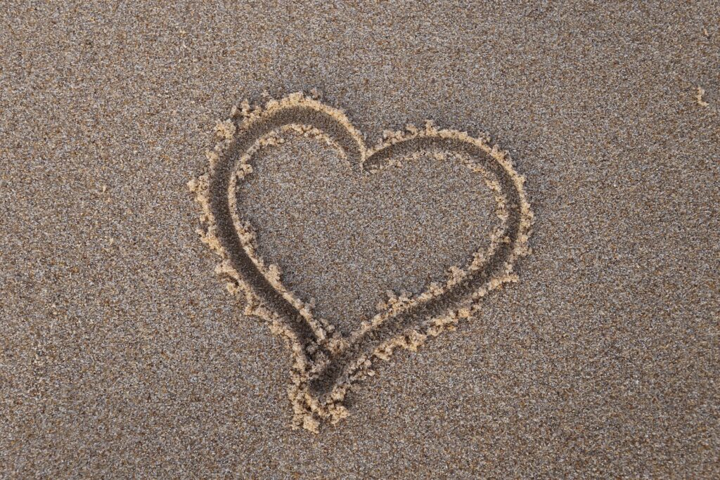Heart drawn in sand