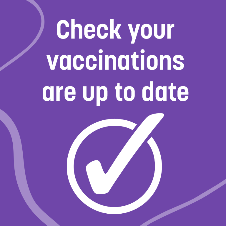 White tick on purple background with words 'Check your vaccinations are up to date'