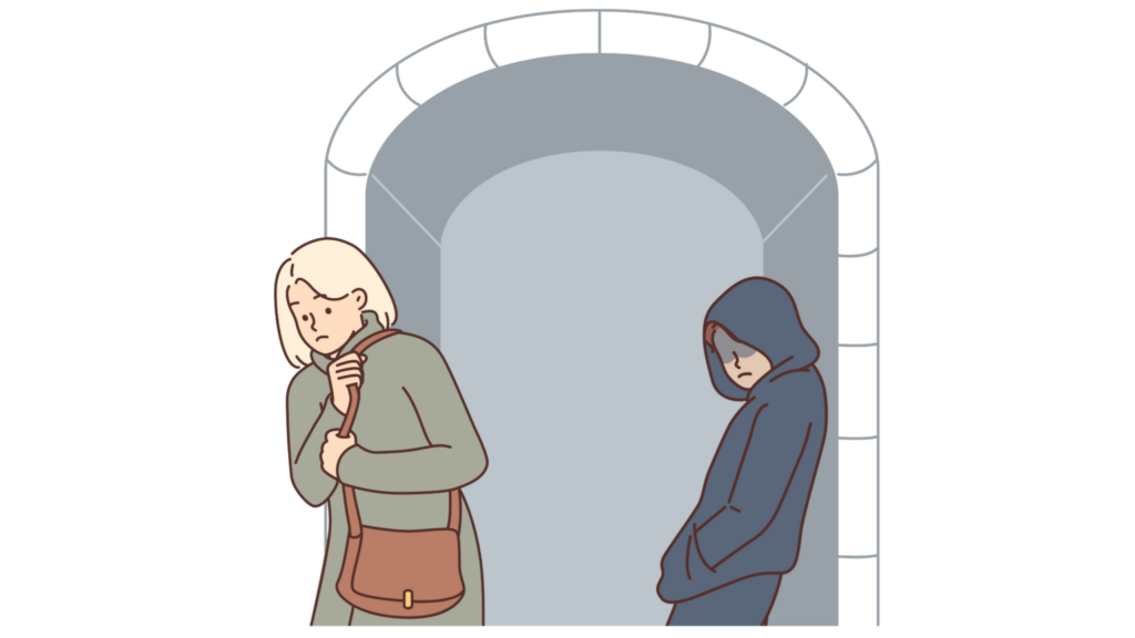 A man leaning against a dark doorway and a woman looking anxious