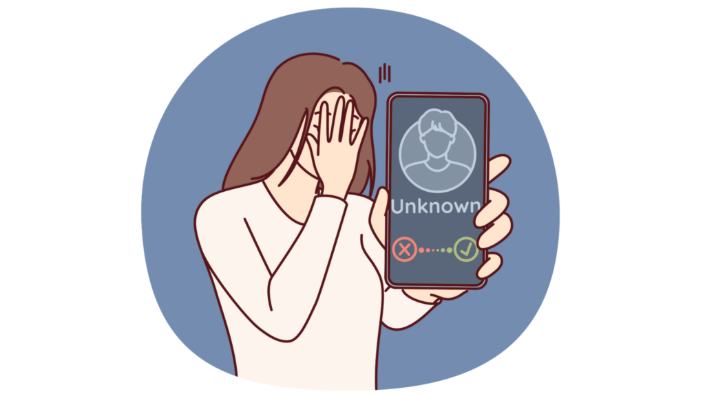 Lady showing that an unknown number is calling her mobile phone. She is covering her face.