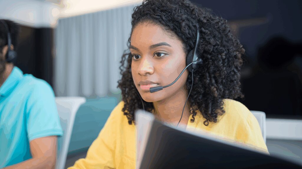 Helpline advisor talking on the phone