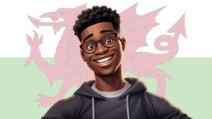 Person smiling in front of the Welsh flag