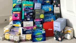 Big pile of period products - pads and tampons