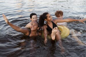 Four people swimming in the sea